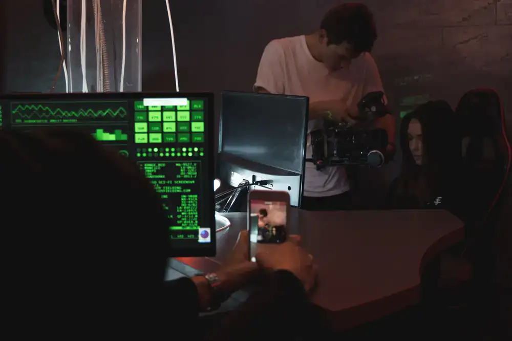 Game developers collaborating intensely at a game jam